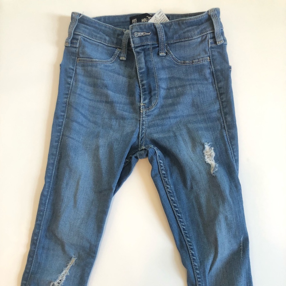 Medium Wash Jeans with two small rips distressing